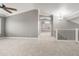 Upstairs loft area featuring plush carpet and staircase at 4226 E Stanford Ave, Gilbert, AZ 85234