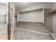 Walk-in closet featuring wood shelving and carpet at 4226 E Stanford Ave, Gilbert, AZ 85234