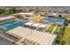 Aerial view showcases the community's recreational amenities, including tennis, pickleball, and shuffleboard courts at 4655 E Farmdale Ave, Mesa, AZ 85206
