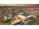 Extensive aerial view showcasing community amenities like tennis courts, pool, and shuffleboard at 4655 E Farmdale Ave, Mesa, AZ 85206