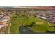 Scenic aerial view of the lush golf course winding through the community at 4655 E Farmdale Ave, Mesa, AZ 85206