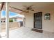 This covered back porch features ceiling fan, and outdoor access at 4655 E Farmdale Ave, Mesa, AZ 85206