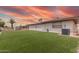 Well-maintained backyard with low-maintenance artificial grass, offering a clean and inviting space at 4655 E Farmdale Ave, Mesa, AZ 85206