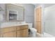This bathroom features a vanity, mirror, toilet, and a glass shower at 4655 E Farmdale Ave, Mesa, AZ 85206