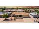 Charming single-story home with a well-kept front yard, mature trees and a two-car garage at 4655 E Farmdale Ave, Mesa, AZ 85206