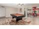 Game room with pool table, and an arcade game and access to the outdoor space at 4655 E Farmdale Ave, Mesa, AZ 85206