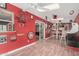 Amusing game room with bar, arcade game, records and unique decor with access to the patio at 4655 E Farmdale Ave, Mesa, AZ 85206