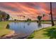 Peaceful pond along the Sunland Village Golf Club surrounded by lush landscaping at 4655 E Farmdale Ave, Mesa, AZ 85206