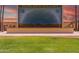 Sunland Village outdoor stage for events and entertainment with desert themed mural at 4655 E Farmdale Ave, Mesa, AZ 85206