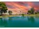 Scenic pond on the Sunland Village golf course with water fountain feature at 4655 E Farmdale Ave, Mesa, AZ 85206