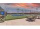Well-maintained tennis court with lush green surroundings, providing a great space for recreation at 4655 E Farmdale Ave, Mesa, AZ 85206