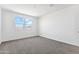 Bedroom with neutral carpet and a bright window allowing natural light at 469 W Bunker Hill St, Florence, AZ 85132