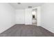 Spacious bedroom with carpeted floors leading to the ensuite bathroom at 469 W Bunker Hill St, Florence, AZ 85132