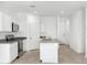 Contemporary kitchen design with granite island and stainless steel appliances at 469 W Bunker Hill St, Florence, AZ 85132