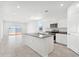 Bright kitchen featuring an island, granite countertops, and stainless steel appliances at 469 W Bunker Hill St, Florence, AZ 85132