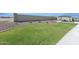 Community park features a grassy area, plants and shaded ramada offering an area to relax at 469 W Bunker Hill St, Florence, AZ 85132