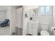 Bright bathroom with white vanity, framed mirror, shower with curtain and tiled floors at 5119 E Shaw Butte Dr, Scottsdale, AZ 85254