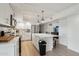 Well-lit kitchen featuring stainless steel appliances, sleek countertops, and ample cabinet space at 5119 E Shaw Butte Dr, Scottsdale, AZ 85254