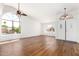 Bright living room with gorgeous floors and large windows offering lots of natural light at 5216 W Oraibi Dr, Glendale, AZ 85308