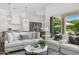 Open-concept living room boasts lots of natural light and views of the outdoor space at 5542 E Alan Ln, Paradise Valley, AZ 85253
