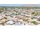 An aerial view of the neighborhood featuring many homes with private backyard pools at 6019 E Windsor Ave, Scottsdale, AZ 85257
