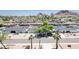 Panoramic aerial view of a residential neighborhood, showcasing a single-level home with mature landscaping at 6019 E Windsor Ave, Scottsdale, AZ 85257