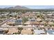 Scenic aerial view of a residential neighborhood with mature landscaping and mountain views at 6019 E Windsor Ave, Scottsdale, AZ 85257