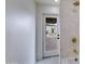 View from tub to outdoor patio and pool through the glass door at 6019 E Windsor Ave, Scottsdale, AZ 85257