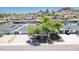 Inviting single-level home featuring mature landscaping, a spacious driveway, and a mountain view in a desirable neighborhood at 6019 E Windsor Ave, Scottsdale, AZ 85257