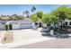 Aerial view of a single-level home featuring a manicured front yard and a spacious driveway at 6019 E Windsor Ave, Scottsdale, AZ 85257