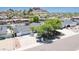 Charming single-level home showcasing a well-maintained exterior, attached garage, and manicured front yard at 6019 E Windsor Ave, Scottsdale, AZ 85257