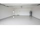 Clean, bright garage with epoxy flooring, perfect for parking and storage at 6019 E Windsor Ave, Scottsdale, AZ 85257