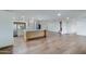 Bright and airy living space featuring wood floors, a large island, and seamless flow into the living areas at 6019 E Windsor Ave, Scottsdale, AZ 85257