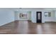 This light filled living room showcases wood floors and a view of the front yard at 6019 E Windsor Ave, Scottsdale, AZ 85257