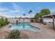 Beautiful backyard pool with brick pavers and a lush outdoor area, ideal for entertaining at 6019 E Windsor Ave, Scottsdale, AZ 85257