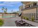 Inviting community pool surrounded by palm trees and well-maintained landscaping at 7319 E Northland Dr # 5, Scottsdale, AZ 85251