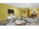 Open-concept living room with a seamless flow to the kitchen and dining area at 7319 E Northland Dr # 5, Scottsdale, AZ 85251