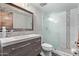 Updated bathroom features a modern vanity, large mirror, and a glass-enclosed shower at 7474 E Earll Dr # 311, Scottsdale, AZ 85251