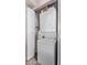 Efficient laundry closet equipped with a stacked washer and dryer unit at 7474 E Earll Dr # 311, Scottsdale, AZ 85251