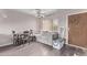 Cozy living room featuring vinyl flooring and a dining area at 7474 E Earll Dr # 311, Scottsdale, AZ 85251