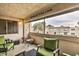 Enjoy outdoor living on this private balcony with comfortable seating and an inviting view of the neighborhood at 7625 E Camelback Rd # A249, Scottsdale, AZ 85251