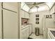 Cozy kitchen featuring white appliances, a double sink, and stylish decor on the walls at 7625 E Camelback Rd # A249, Scottsdale, AZ 85251