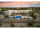 Aerial view of expansive backyard with pool, lounge chairs, and desert landscaping with mountain views at 9022 E Diamond Rim Dr, Scottsdale, AZ 85255