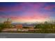 Panoramic city views from the rooftop with lights from city illuminating the evening sky at 9022 E Diamond Rim Dr, Scottsdale, AZ 85255