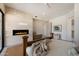 This main bedroom features a fireplace on a tile accent wall at 9022 E Diamond Rim Dr, Scottsdale, AZ 85255