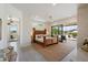 Open and spacious main bedroom with access to the patio and swimming pool at 9022 E Diamond Rim Dr, Scottsdale, AZ 85255