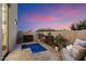 Private backyard patio featuring a small pool, neutral tiling, and contemporary outdoor furniture at 9022 E Diamond Rim Dr, Scottsdale, AZ 85255