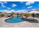 Beautiful outdoor pool and spa area with modern design, lush landscaping, and serene mountain views at 9022 E Diamond Rim Dr, Scottsdale, AZ 85255