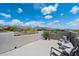 Scenic roof deck with comfortable seating and panoramic views of the mountains and desert landscape at 9022 E Diamond Rim Dr, Scottsdale, AZ 85255