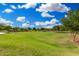 A community park features a grassy area, perfect for recreational activities and enjoying the outdoors at 10352 E Sebring Ave, Mesa, AZ 85212